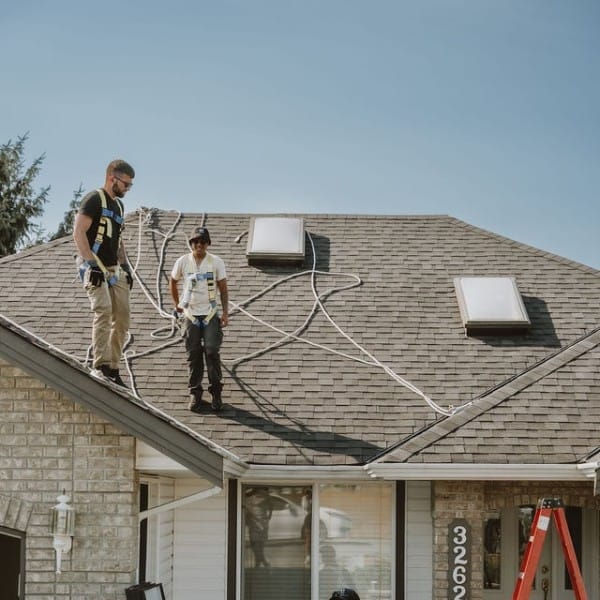 Expert Team on the roof installing solar panels